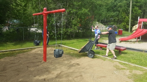 Member pushing wheel barrel 